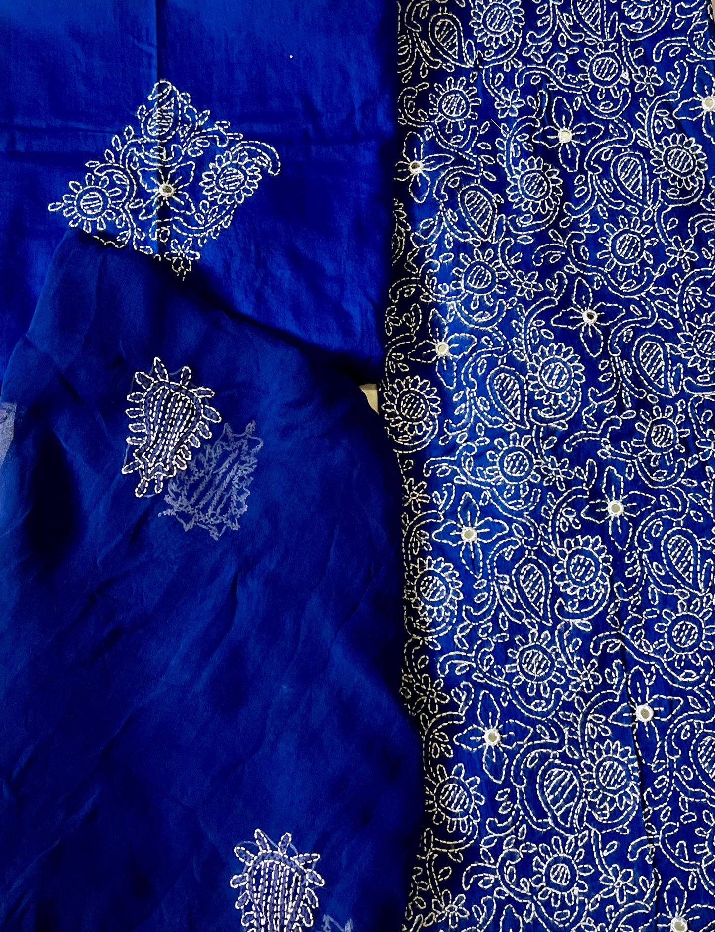 One of the oldest and most loved embroidery styles is Chikankari. Cross Stitch brings the delicate artistry of Chikankari blending it with modern flare.-Navy