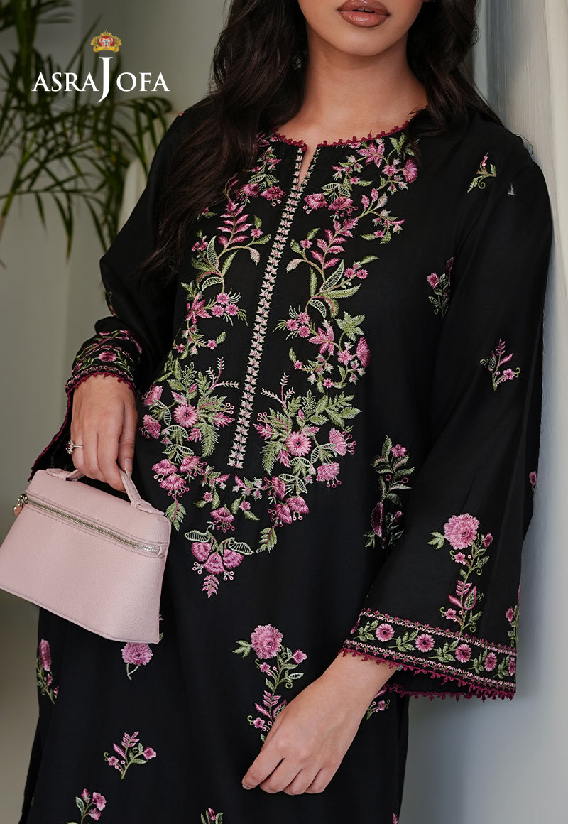 Asra Jofa ASAE-08 detailed close-up of black cambric kurta featuring pink rose embroidery, green leaf motifs, silver placket and pink pom-pom cuff trim
