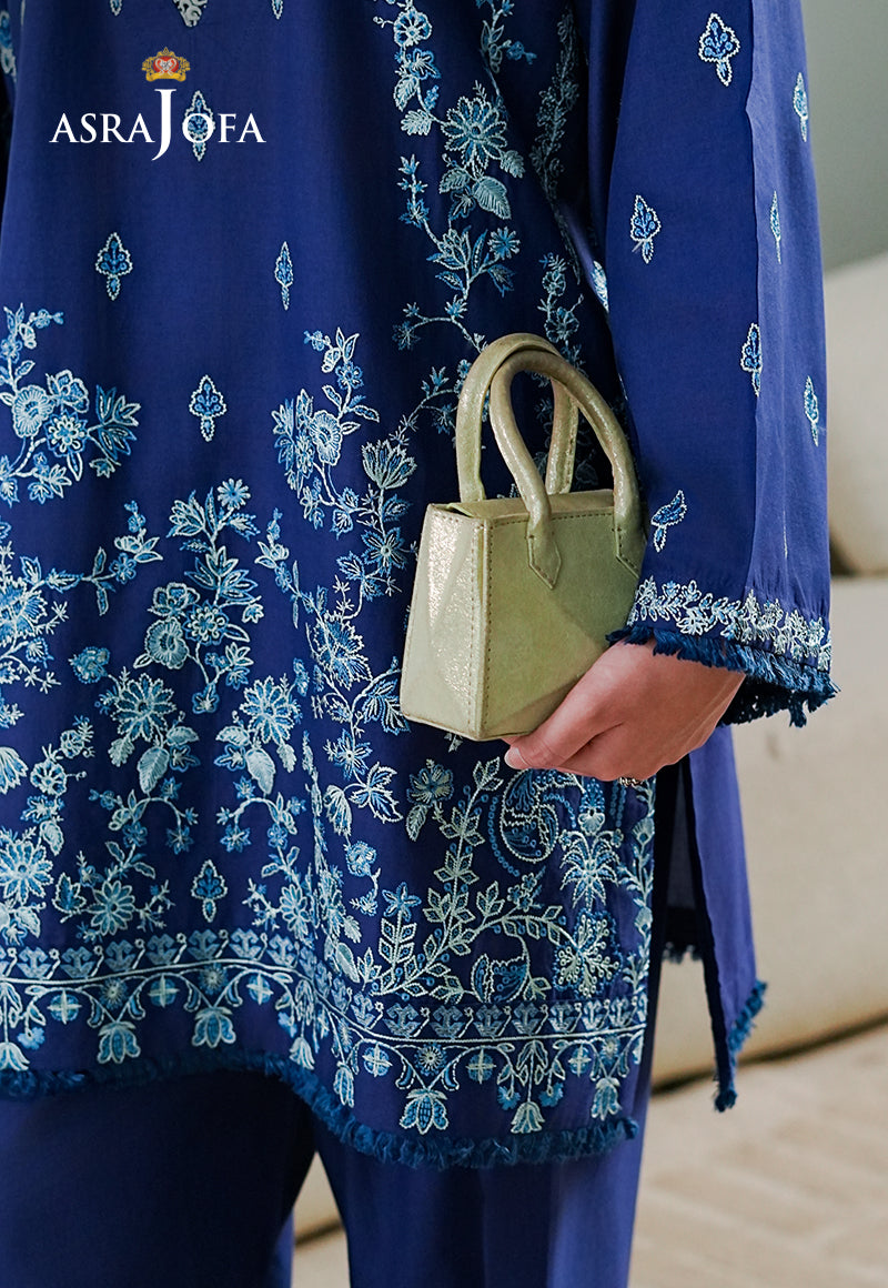 Asra Jofa ASAE-06 close-up of royal blue cambric kurta with dense teal and silver floral embroidery and fringe hem border detail
