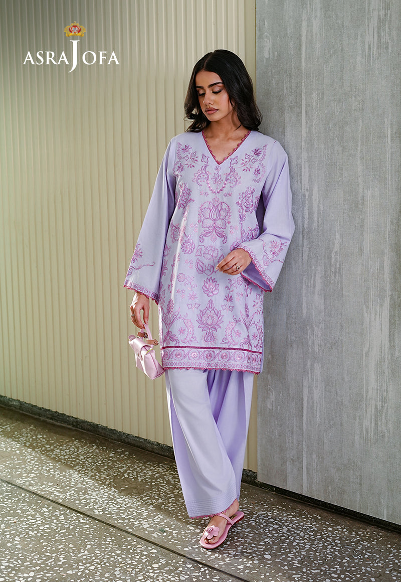 Asra Jofa ASAE-01 lavender embroidered cambric 2-piece suit – model looking down, side pose