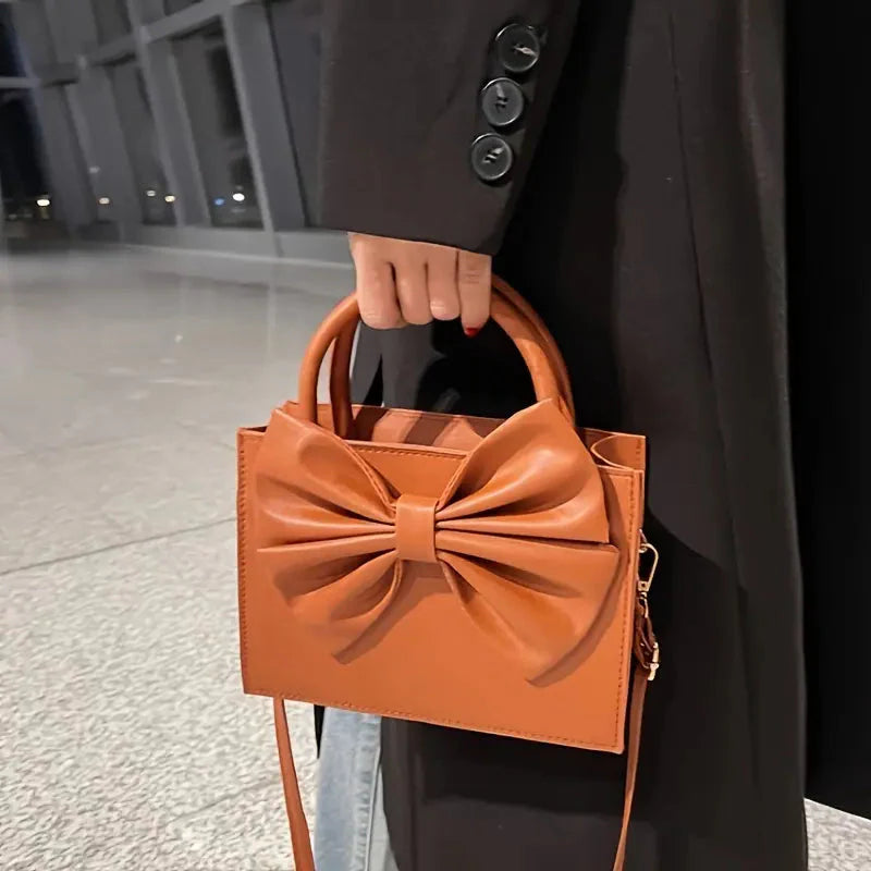 Branded brown women’s handbag