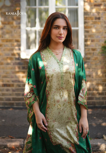 Rania Jofa Emerald RJPS-06 cream charmeuse silk scenic printed shirt with emerald green dupatta – upper body front facing London brick wall view with gold necklace