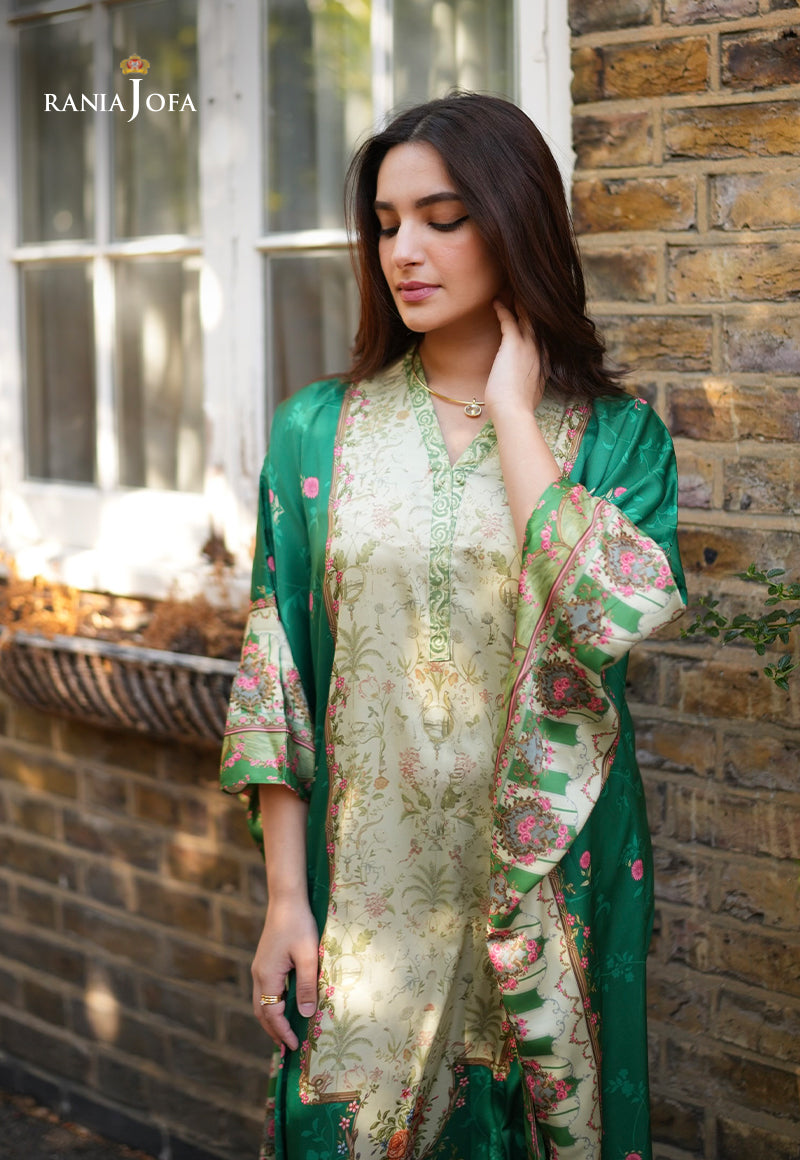 Rania Jofa Emerald RJPS-06 cream charmeuse silk vintage printed shirt with emerald green dupatta – upper body close-up eyes-down pose London brick wall view